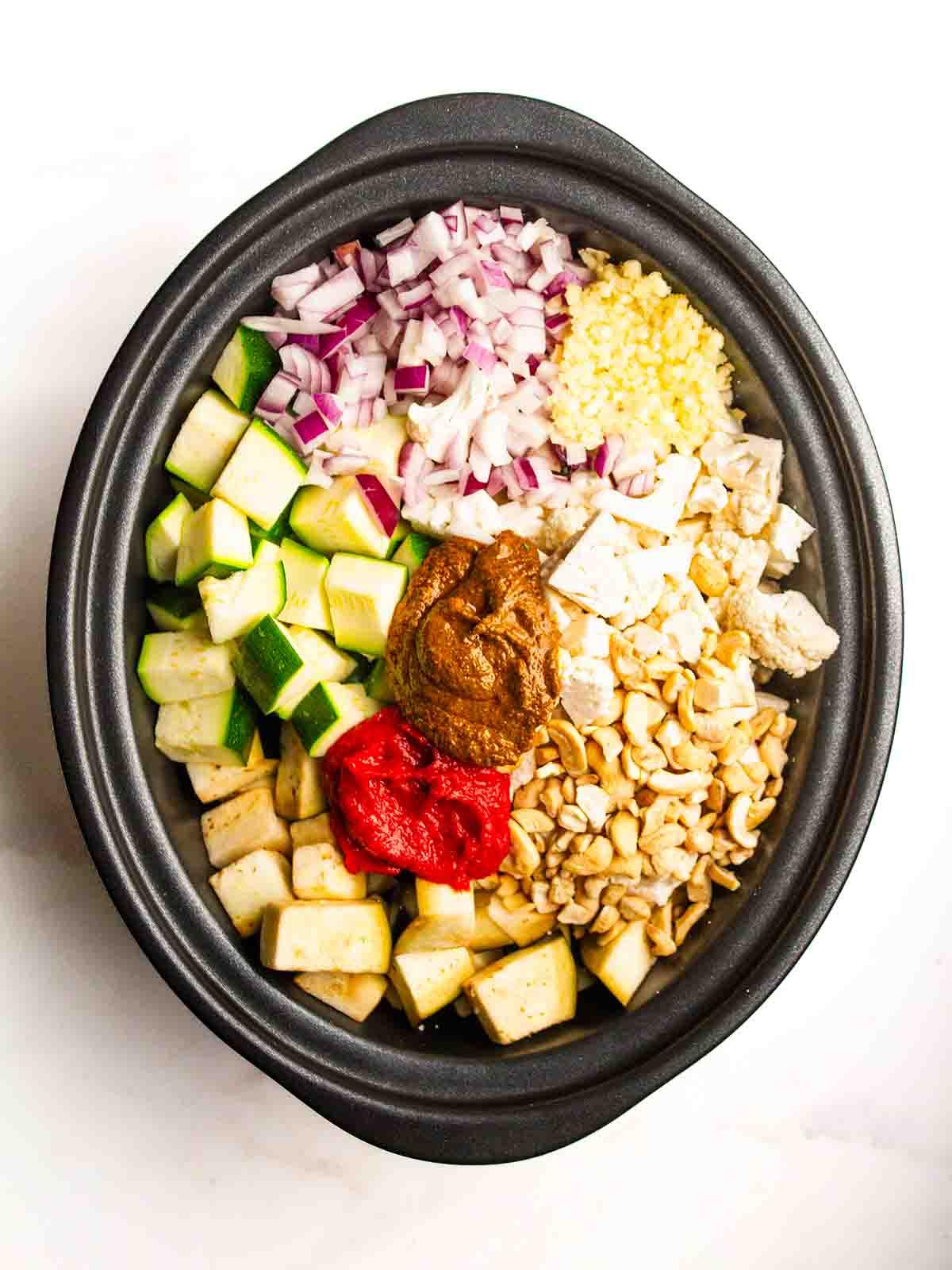 Step 1 showing putting all of the raw ingredients into the slow cooker.
