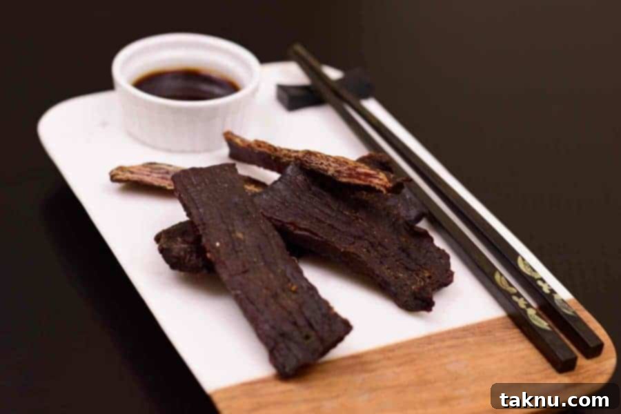 Close-up of finished Teriyaki II Beef Jerky, showing its texture and doneness.