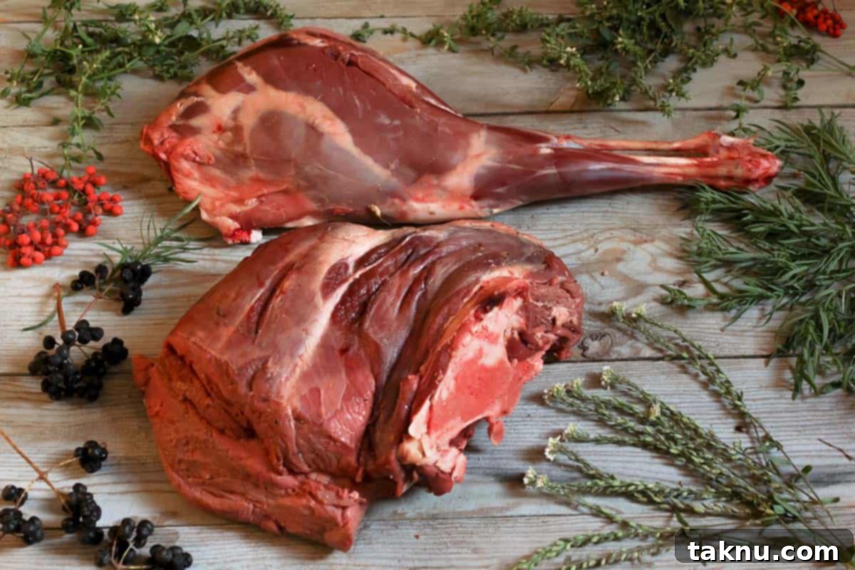 Deer meat on cutting board with spices, showcasing its lean texture for venison jerky