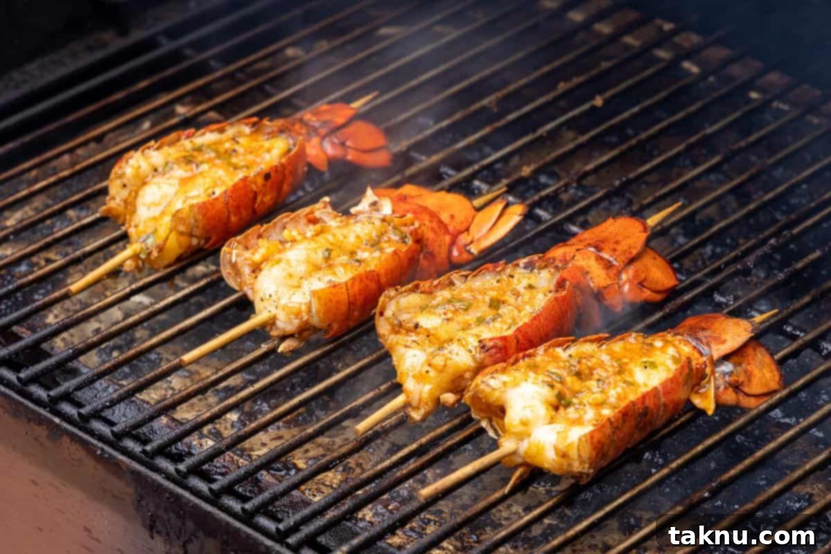 Lobsters smoking on grill