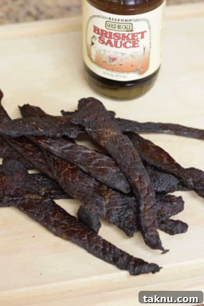This easy to make brisket marinade jerky is finger licking good! | Jerkyholic.com