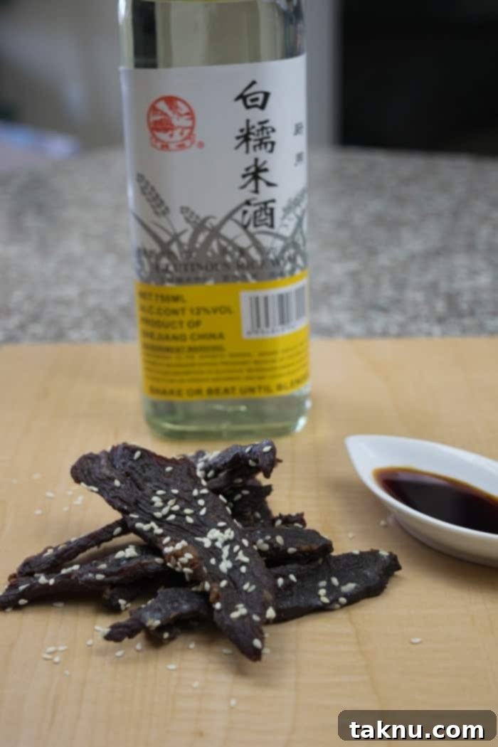 Delicious Korean BBQ Beef Jerky strips ready for snacking, capturing the authentic flavor of Korean BBQ pork dishes.