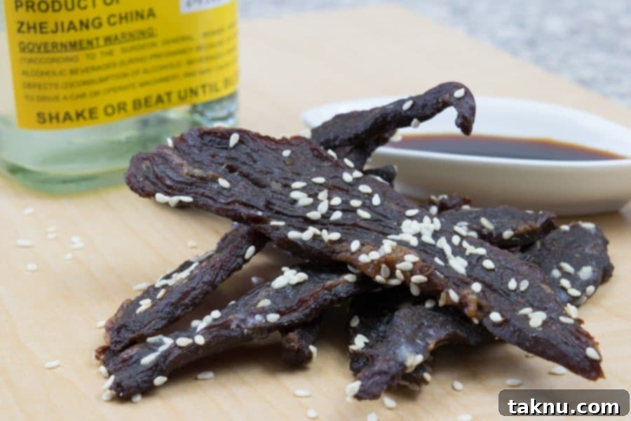 Perfectly finished Korean BBQ Beef Jerky, showcasing its rich color and inviting texture.