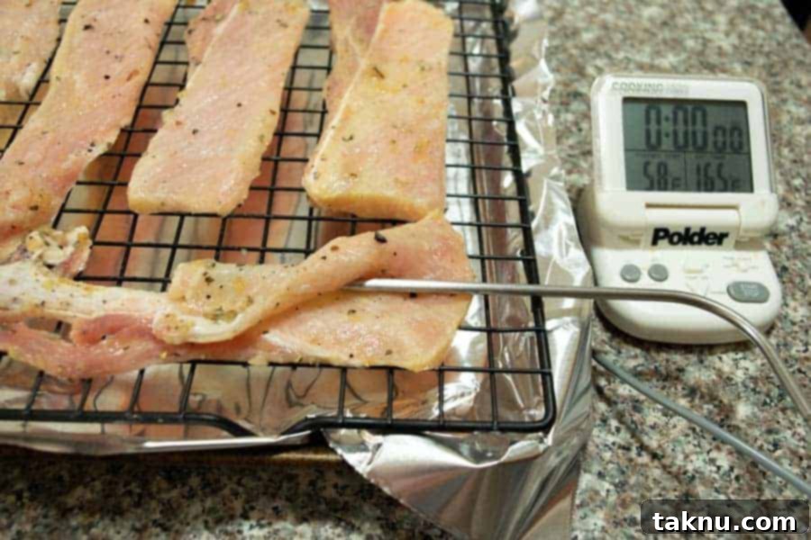 Apple Sage Jerky on baking sheet