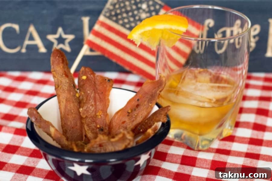 Citrus Bourbon Jerky with american flag with glass of bourbon