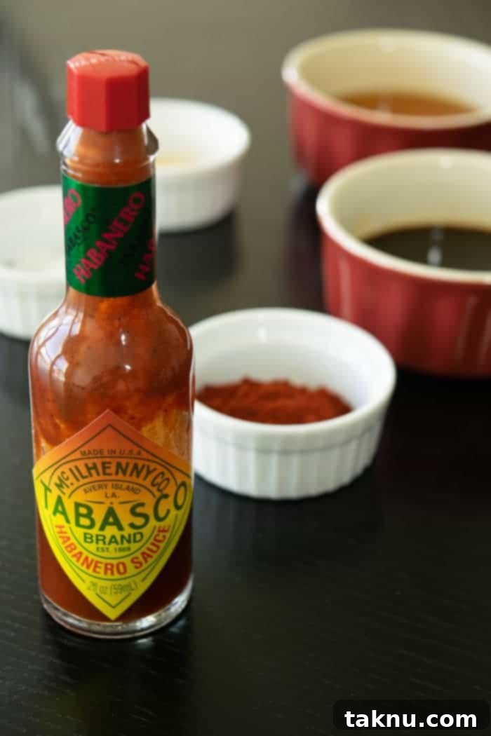 All the essential ingredients for habanero beef jerky neatly laid out on a table, ready for combining.