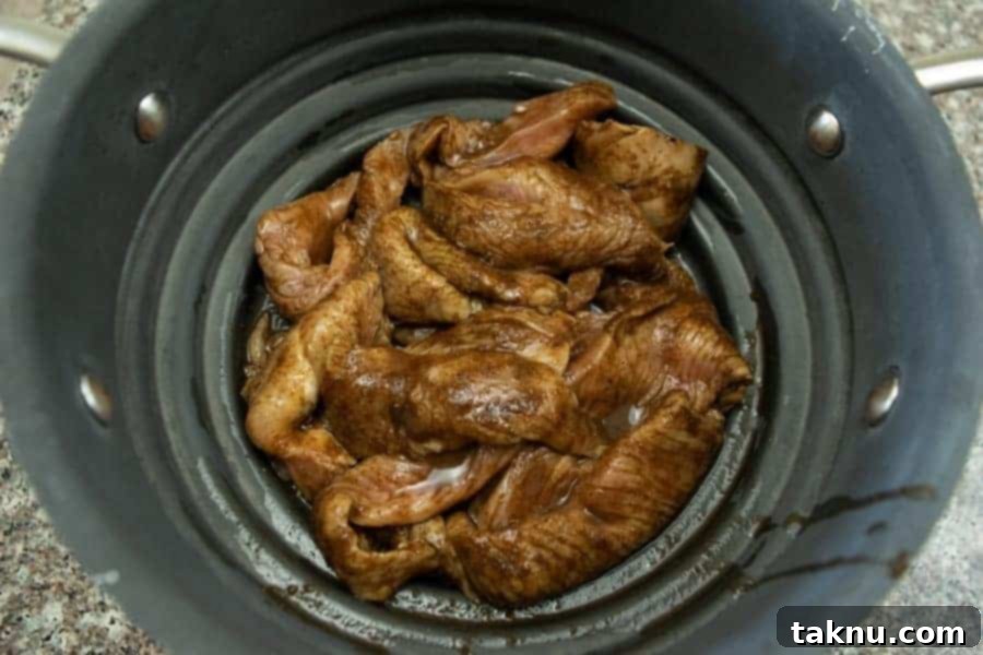 Indulgent Mole Turkey Jerky 6 mole turkey jerky straining in colander