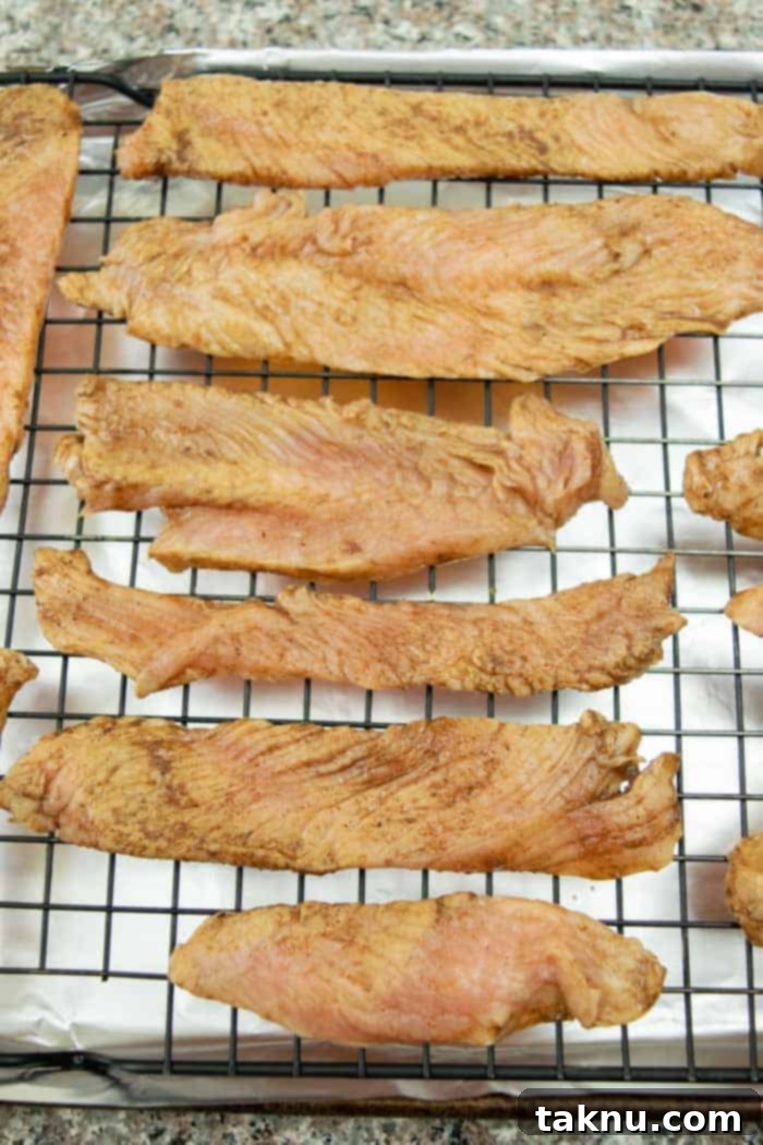 Indulgent Mole Turkey Jerky 8 Mole turkey jerky on oven rack for preheat