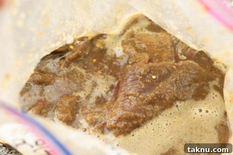 deer jerky marinating in ziplock bag