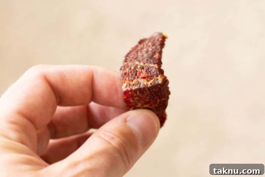 Blazing Cherry Beef Strips 13 Finished jerky being bent