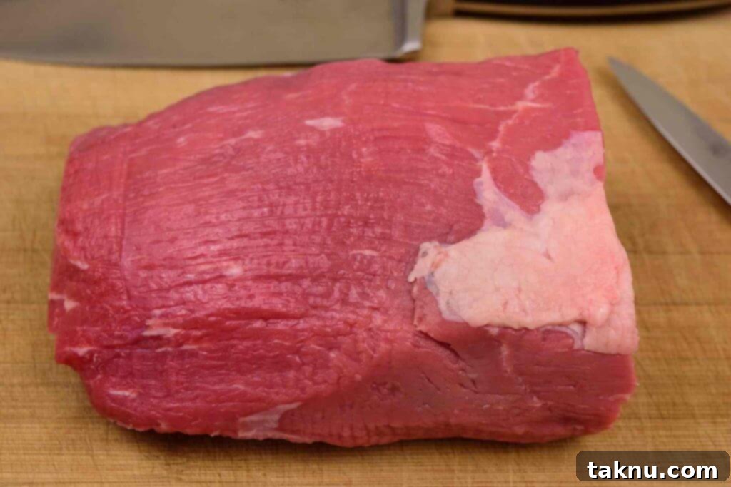 Blazing Cherry Beef Strips 3 Eye of Round Roast on cutting board