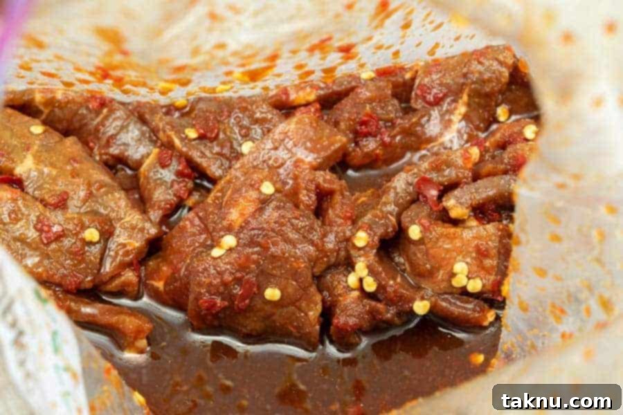 Blazing Cherry Beef Strips 8 Jerky marinating in bag