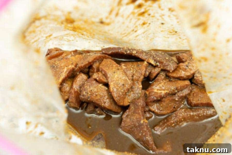 Vintner's Mash Beef Jerky 6 Beef jerky marinating in a ziplock bag with liquid