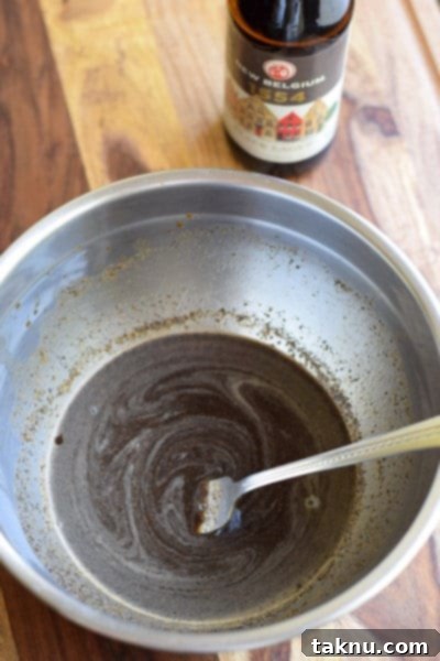Kings County's Smoked Jerky beef slices marinating in a bowl