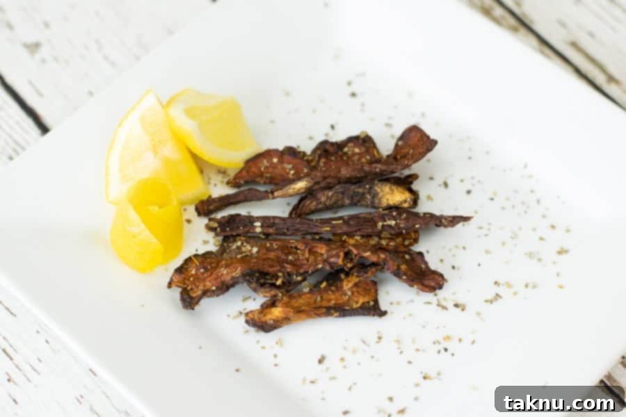 slices of lemon and mushroom jerky on plate