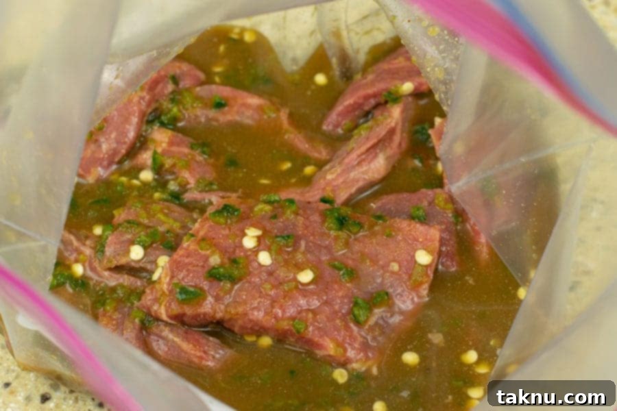 Blaze Beef Jerky 11 Beef jerky strips marinating in a sealed ziplock bag in the refrigerator