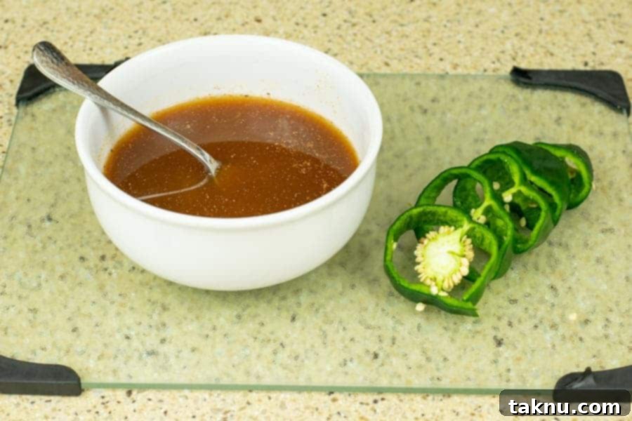 Blaze Beef Jerky 8 Fresh poblano peppers for jerky preparation, alongside a bowl of marinade ingredients