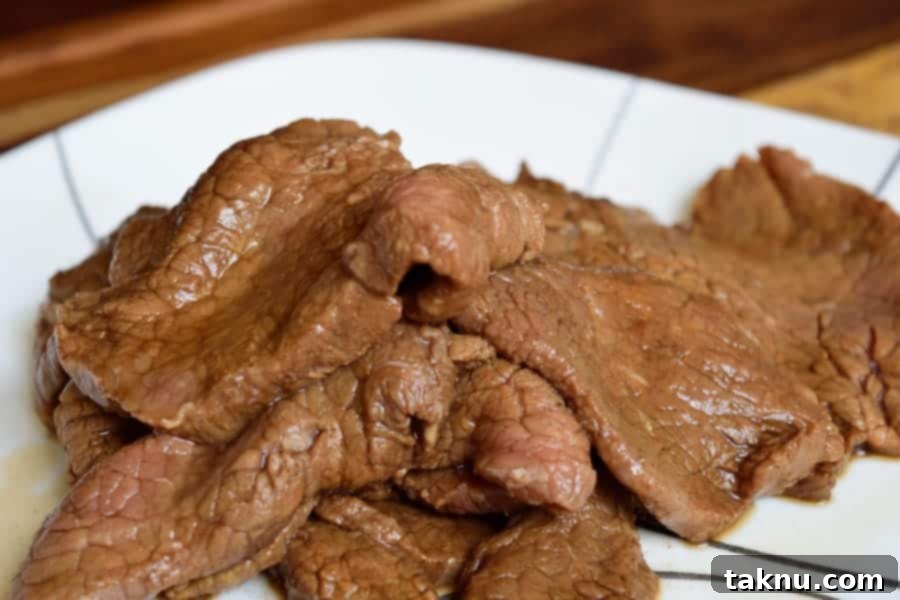 Simply Sweet Beef Jerky Marinating in homemade marinade