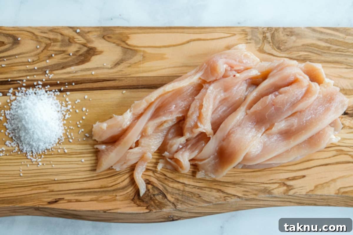 Ultimate Turkey Jerky 4 Turkey sliced into jerky strips on cutting board