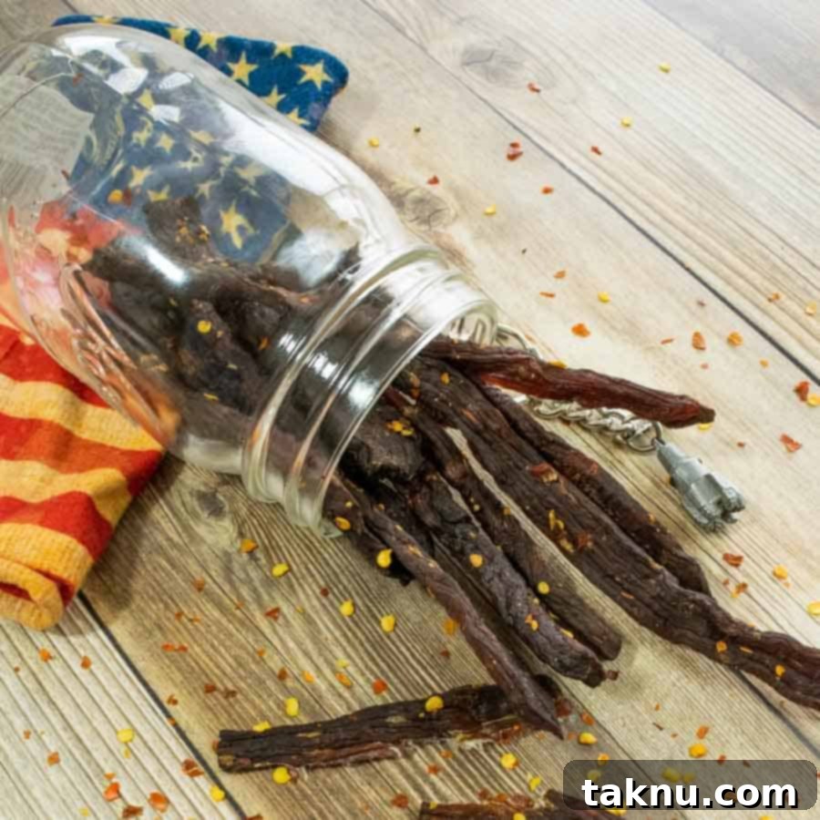 Homemade Dehydrator Beef Jerky 13 Homemade Beef Jerky stored in a mason jar with a decorative American flag