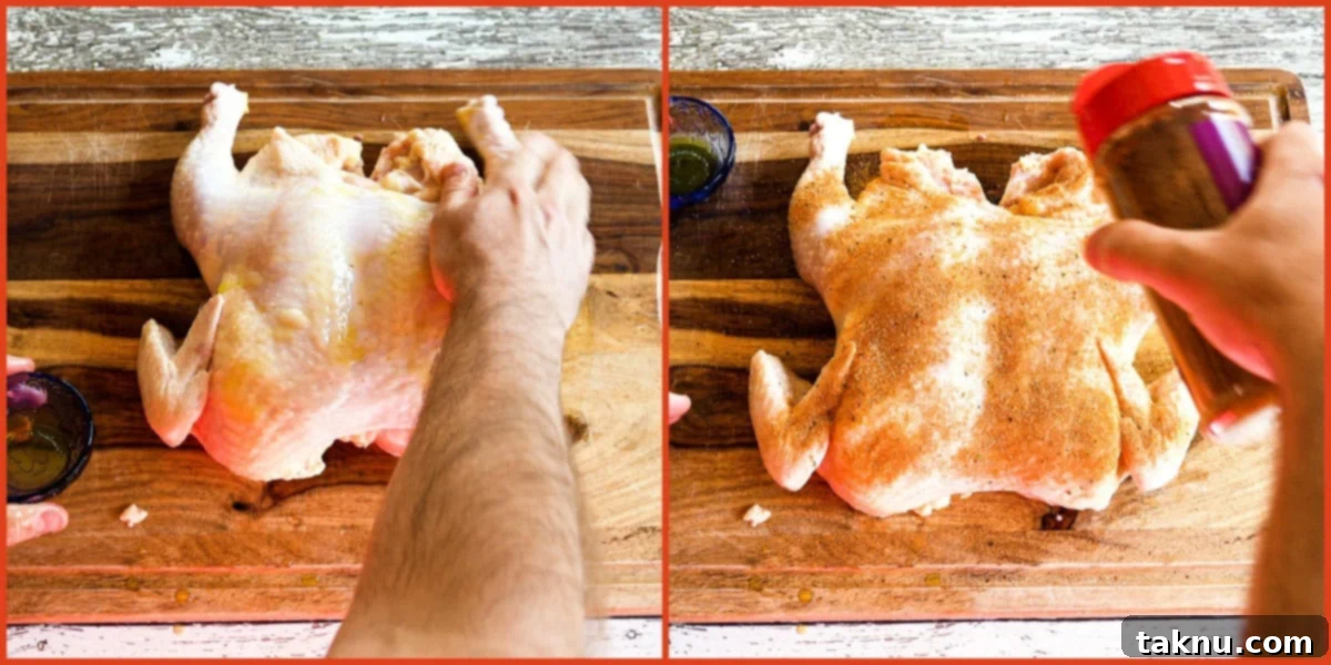 Rubbing spatchcock chicken with olive oil and seasoning