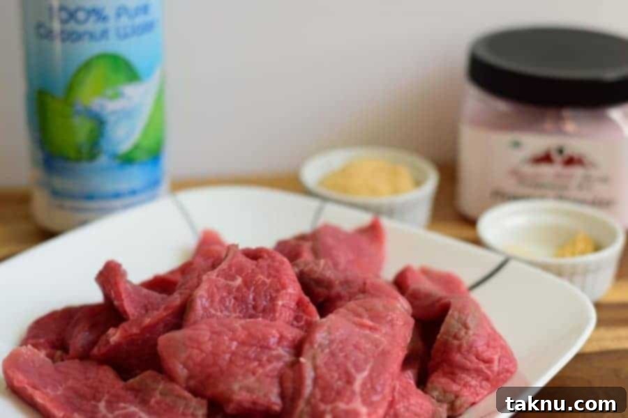 Slices of lean beef eye of round, prepared for making Tropical Island Beef Jerky