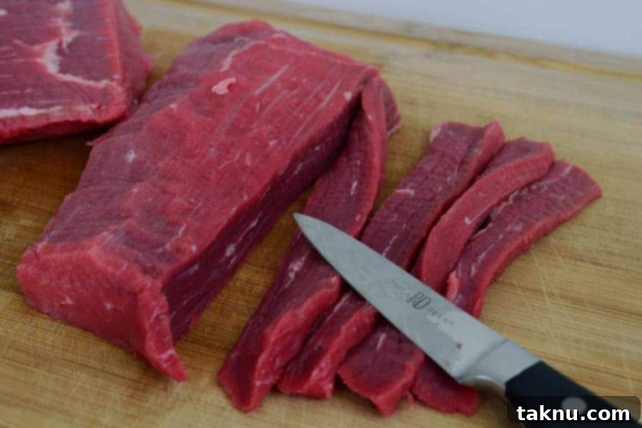 Tropical Mai Tai Beef Jerky 4 Thinly sliced beef eye of round, marinated for Mai Tai Beef Jerky