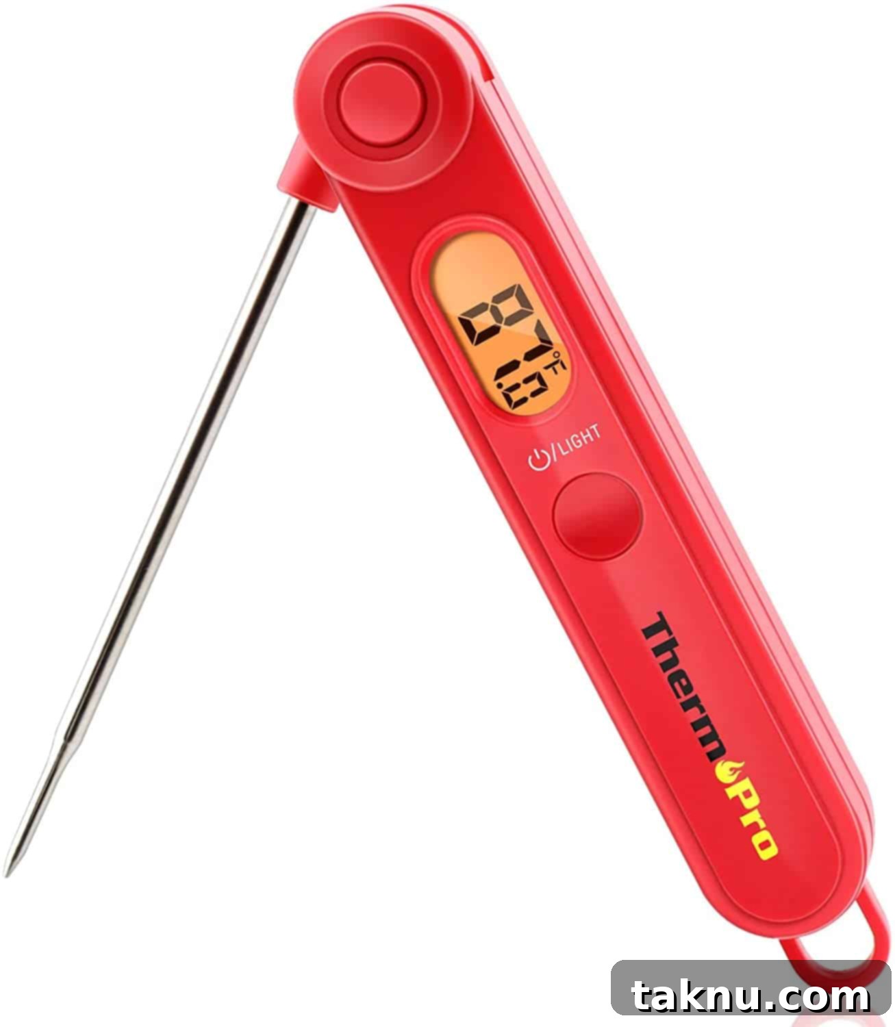 Red digital meat thermometer inserted into a piece of cooked meat.