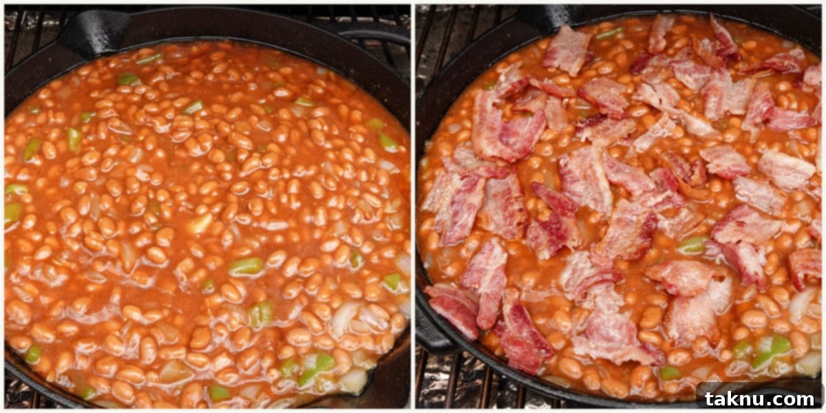 Smoky Bacon Baked Beans 5 Smoked baked beans simmering in a cast iron pan, topped with crispy crumbled bacon.