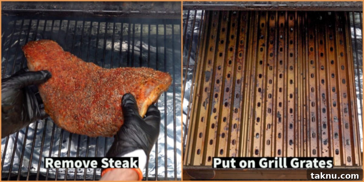 Grill grates heating up on the smoker, with a hand carefully removing the partially smoked tri-tip steak.
