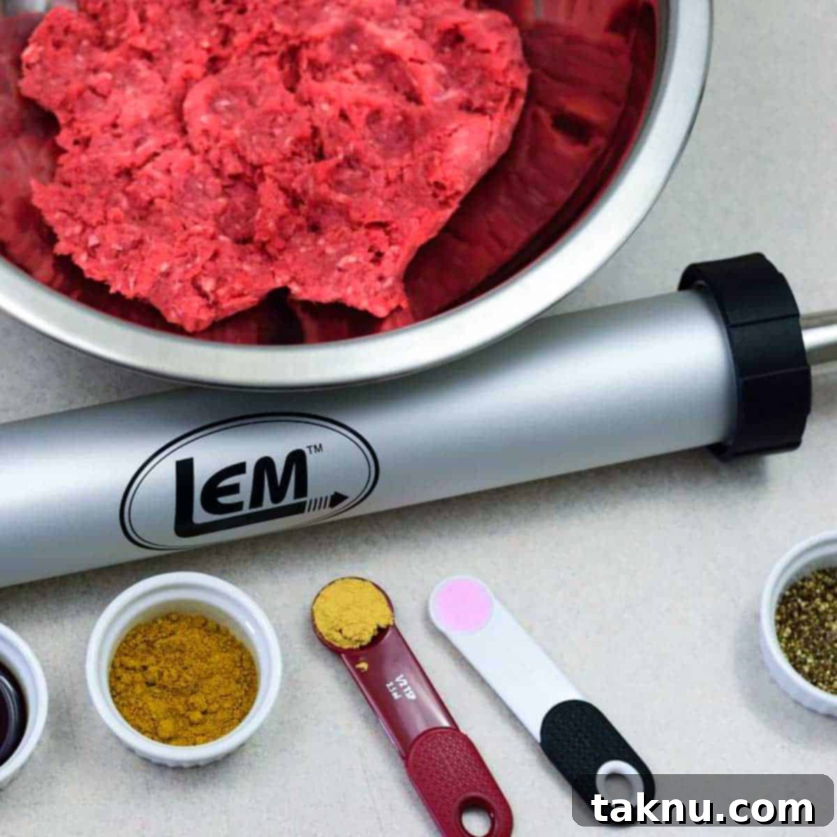 Ground beef jerky with jerky cannon and spices