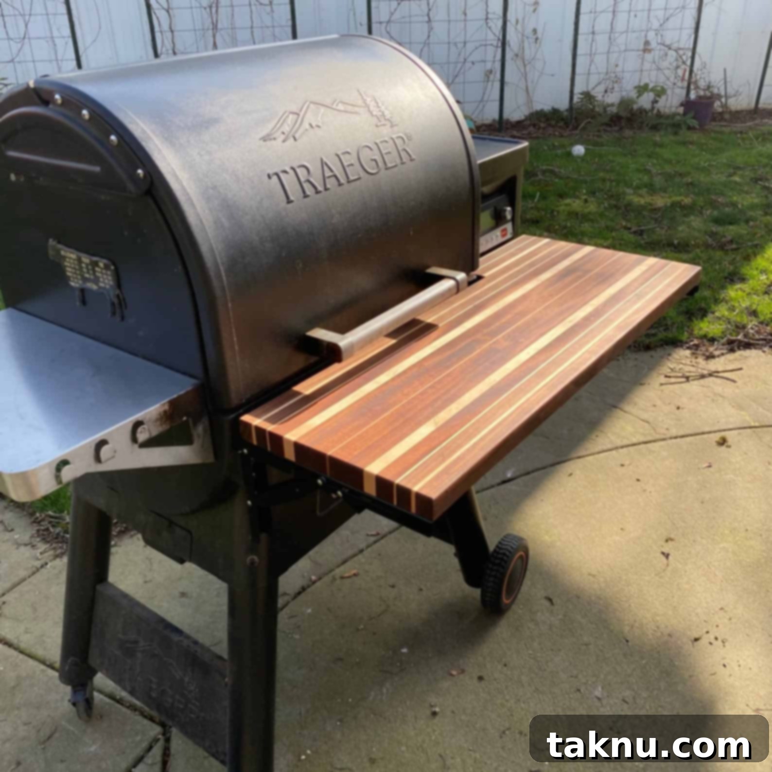 Best Pellet Smokers of 2025 Your Ultimate Buyers Guide 14 Traeger grill with custom front shelf made of wood