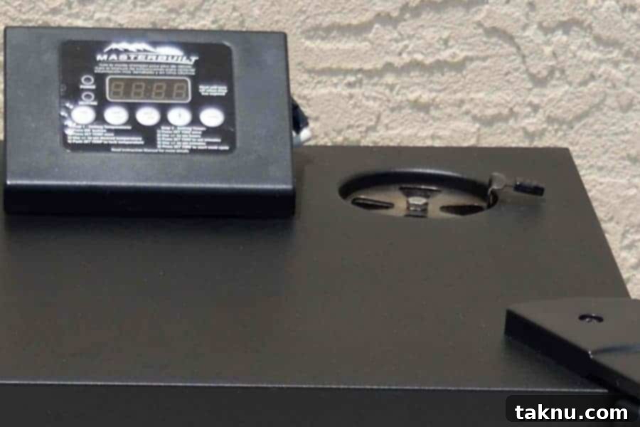 Crafting Smoked Beef Jerky 12 Smoker with its top vent fully open, indicating proper airflow for jerky drying.