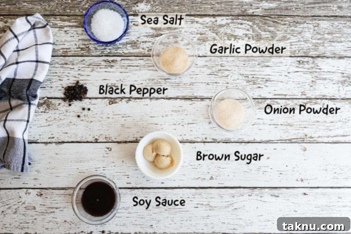 Crafting Smoked Beef Jerky 7 All the essential ingredients for the beef jerky marinade laid out on a white wood background.