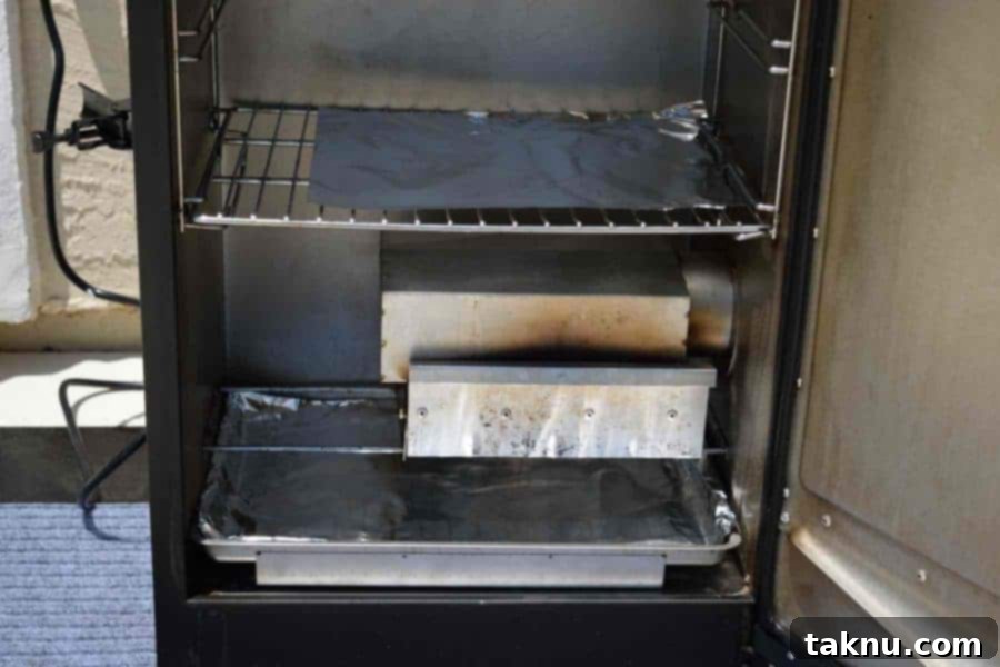 Crafting Smoked Beef Jerky 9 Aluminum foil strategically placed inside the smoker to aid in cleanup and airflow.
