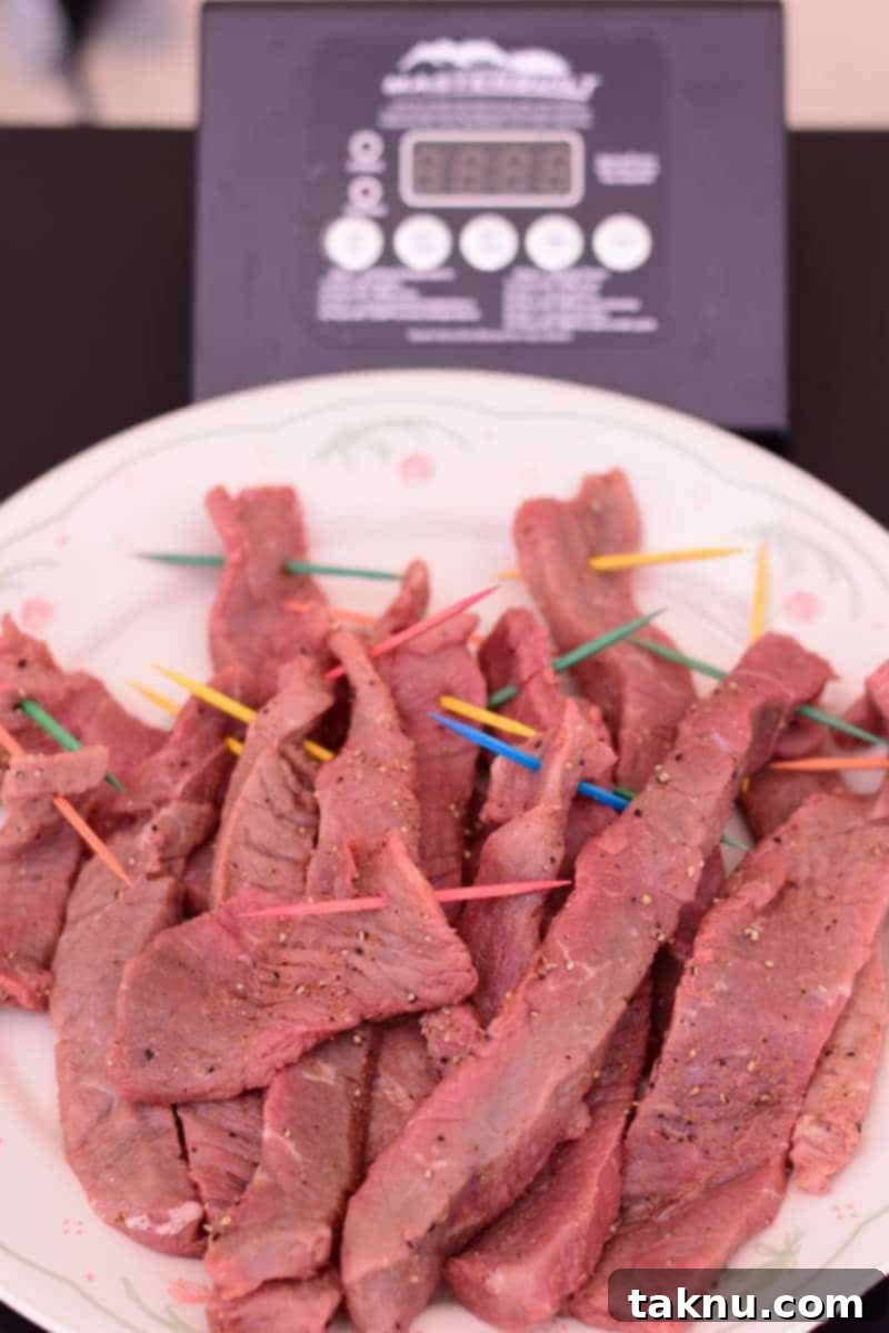 Delicious Tequila Beef Jerky, a strip of beef with a unique flavor profile. | Jerkyholic.com